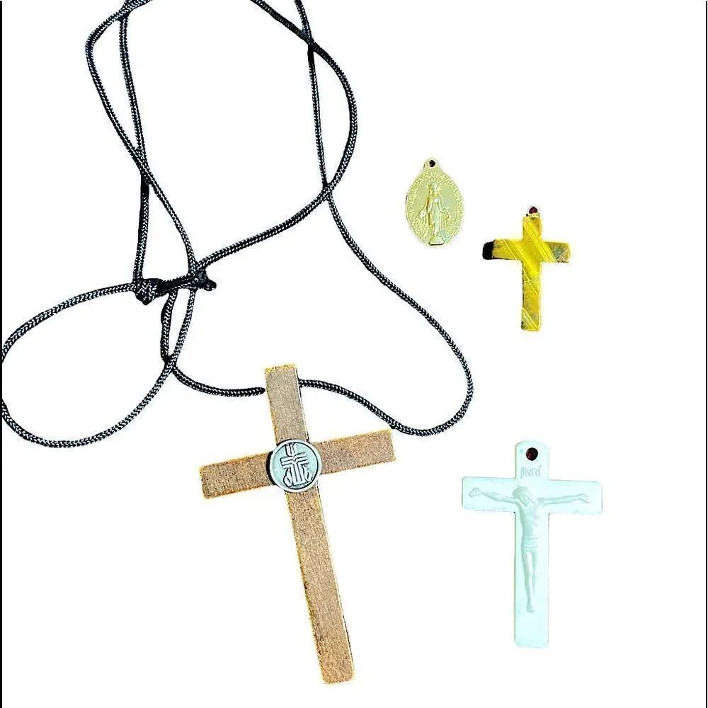 Collection of four  Christian Pendants - wood, tigers eye, gold tone